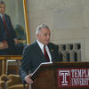 Temple's seventh President Peter J. Liacouras standing at a podium.