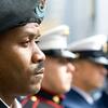 Uniformed service members attending a Temple Veterans Day ceremony.