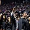 Graduates celebrating at Temple's Commencement ceremony.