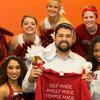 Temple cheerleaders and Hooter surprise an alumnus at the Comcast Building.