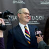 Steve Charles smiling while being interviewed on camera by Temple Update.