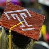 A graduation cap decorated to show the Temple
