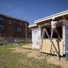 A construction worker working on the tiny house.