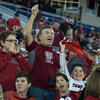Temple alumnus Bill DeSio cheering in the stands.