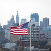 American flag with Philadelphia skyline