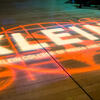 Klein College s logo projected onto a stage