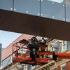 Man working on construction at Fox skywalk