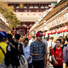 People walking down a street in Tokyo