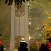 students walking by Temple Bell Tower