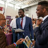 Temple s Michael Robinson talking to job seekers at the 2019 Annual Job Fair.