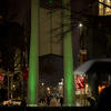 the bell tower on Main Campus, lit with green lights for Black History Month