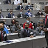 Image of Temple President Jason Wingard speaking in the Lewis Katz School of Medicine auditorium.