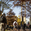 Image of students walking past the Bell Tower on Main Campus.