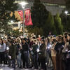 Students participate in a candlelight vigil on Main Campus.