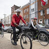 Image of Temple President Jason Wingard riding a bike.