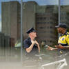 PPD and TUPD police officers talking outdoors