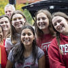 Temple students wearing Temple logo gear.