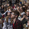 Image of students wearing eclipse glasses to view the April 8 solar eclipse.