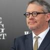 Adam McKay posing at an event for his film The Big Short.