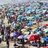 Crowded beach pictured.