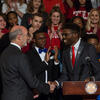 Gov. Tom Wolf shakes hands with student body President Tyrell Mann-Barnes