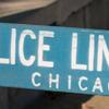 A wooden, blue police line barricade in Chicago.