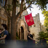 A photo of the Temple flag outside Sullivan Hall