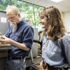 Image of of Terry and Shreero sorting through fossils in Terry's office.