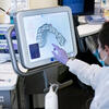 Temple dental clinician reviewing 3D scan of teeth
