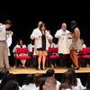 Pharmacy school students receive their white coats during the ceremony.