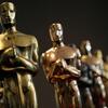 Several Oscar statuettes.