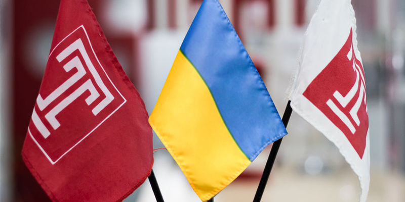 Image of the Ukrainian flag and two Temple flags.