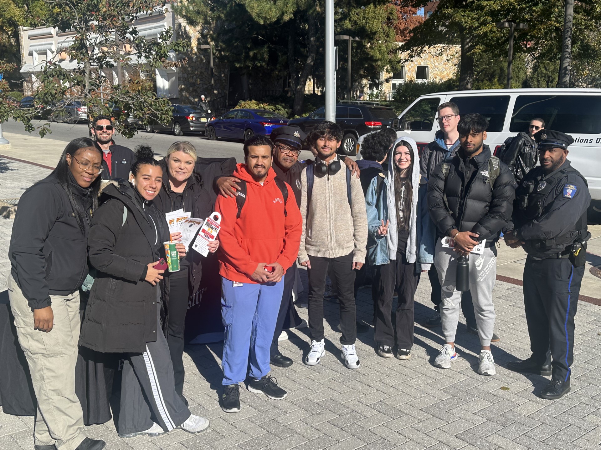 An image of Temple students with Temple Police Officers.