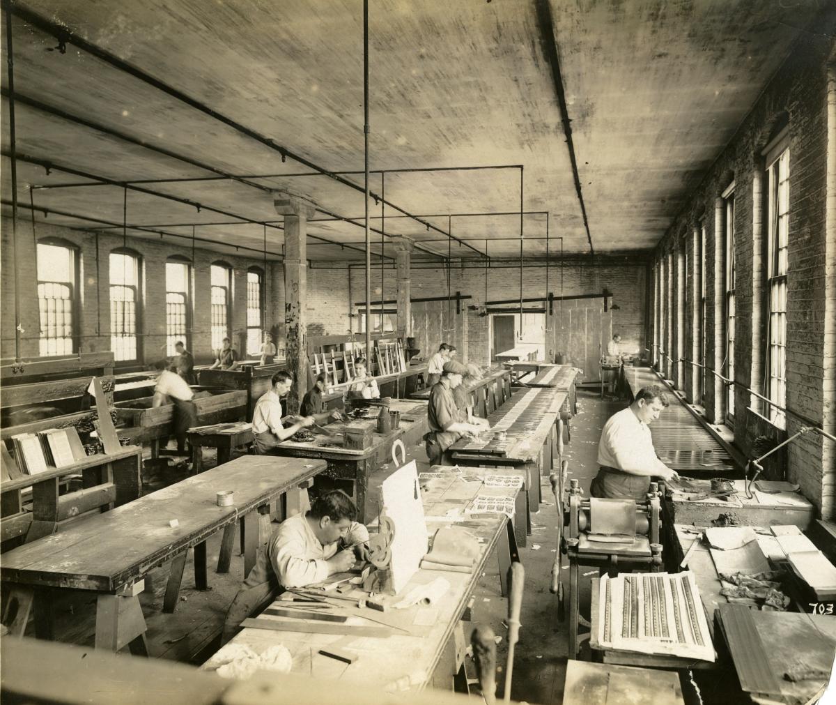 Photograph of workers etching labels onto saws at Disston Saw, Tool and File Works, Philadelphia, Pennsylvania, circa 1920s. United Saw, Files, and Steel Product Workers of America Records, Special Collections Research Center, Temple University Libraries.